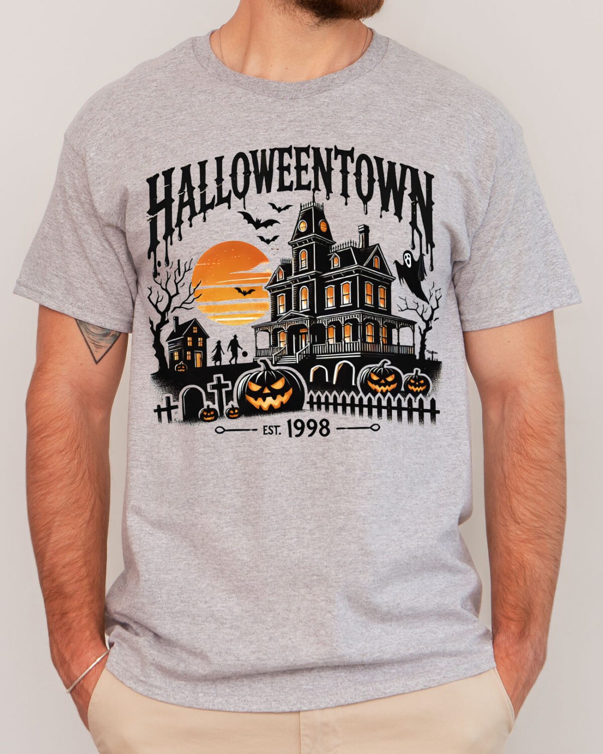 Man wearing a Halloweentown shirt in sport grey color