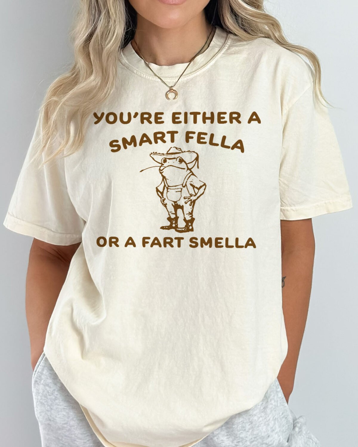 You're either a smart fella or A fart smella shirt in natural color