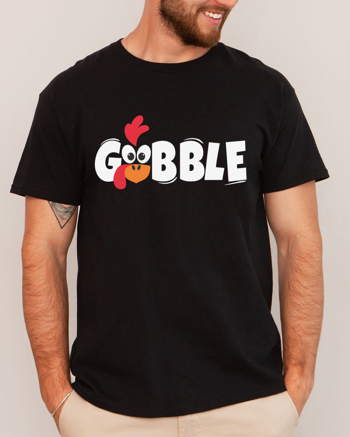 Man wearing a funny gobble shirt in black color